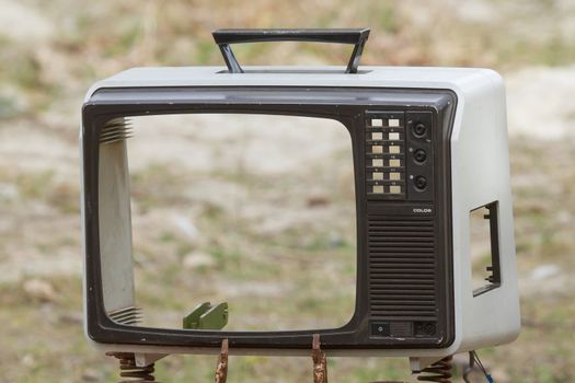 Grungy old TV set without a screen (Holland)