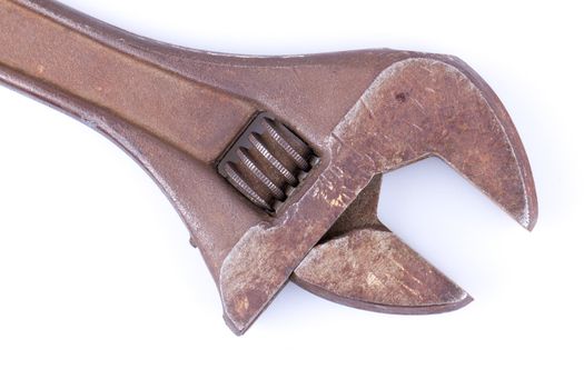 An old rusty vector wrench on a white background