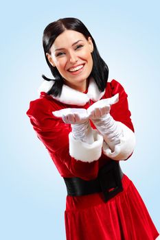 Santa Girl presenting your product, in costume and white gloves