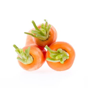 Heap of carrots isolated on a white background