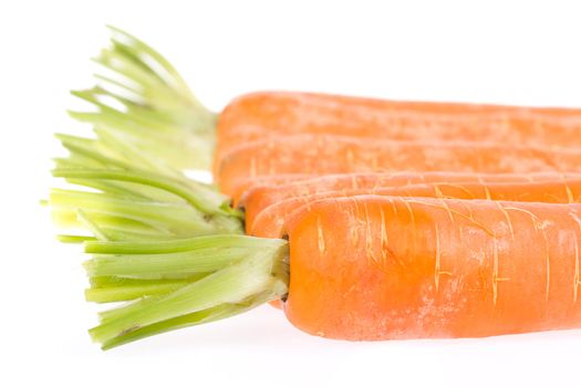 Heap of carrots isolated on a white background