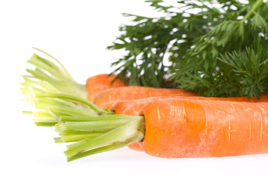 Heap of carrots isolated on a white background