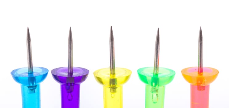 Set of colorful push pins isolated on a white background