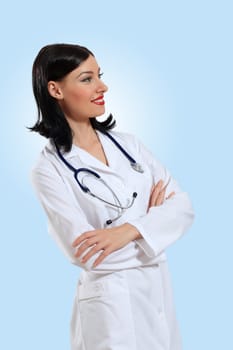 Portrait of happy successful young female doctor holding a stethoscope