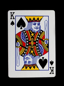 Playing card (king) isolated on a black background