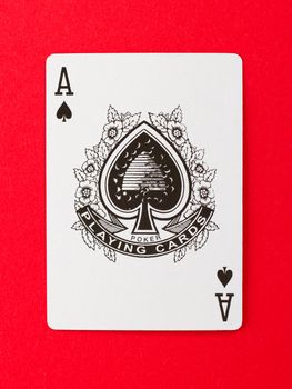 Playing card (ace) isolated on a red background