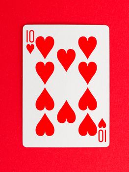 Playing card (ten) isolated on a red background
