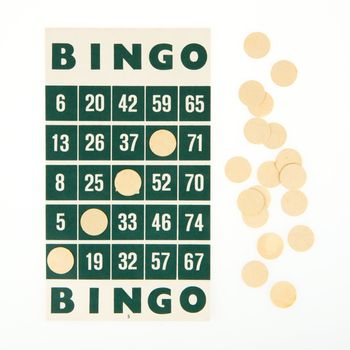 Green bingo card isolated on a white background