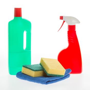 House cleaning product. Plastic bottles with detergent and sponge isolated on white background