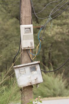 Cabinet with electrical meter on a concrete pole in Vietnam