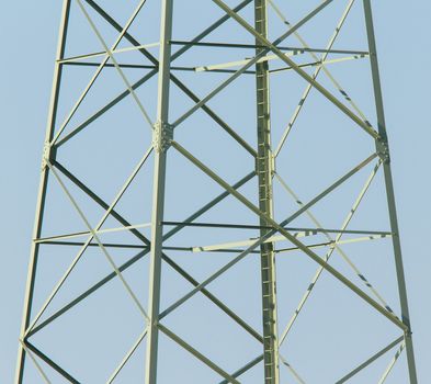 Stairs in an electricity pylon, on a blue background