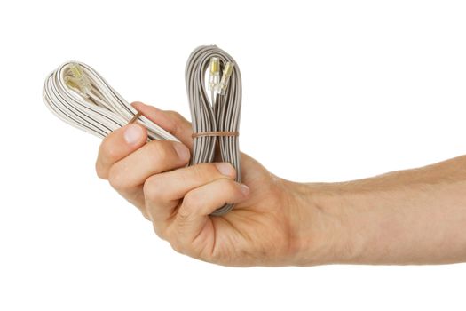 Speaker cable in a hand, isolated on a white background