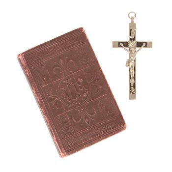 Old antique bible and cross on a white background, isolated