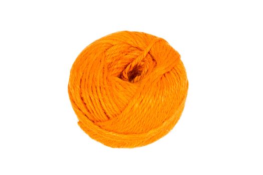 Orange knitting yarn isolated on a white background