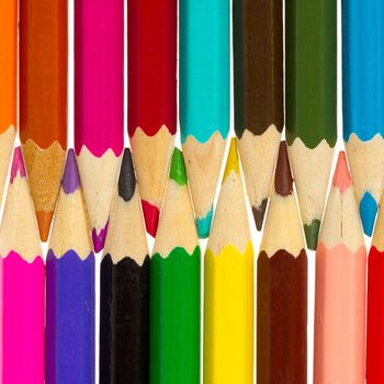 Many different color pencils isolated on white