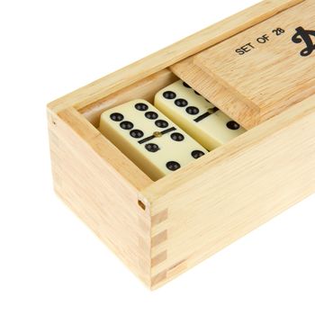 Domino in wooden box against the white background