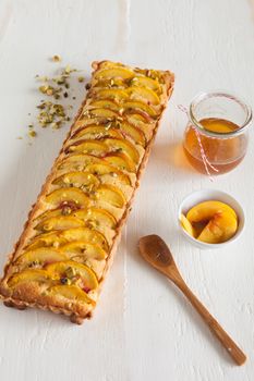 Nectarine tart with pistachio