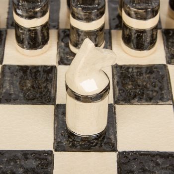 Unique handmade chess set (pottery), isolated, Holland