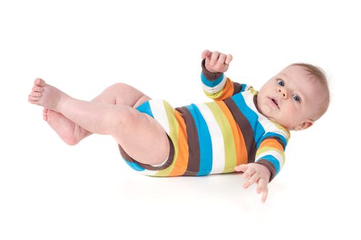 Little cute baby in striped body lying on white background