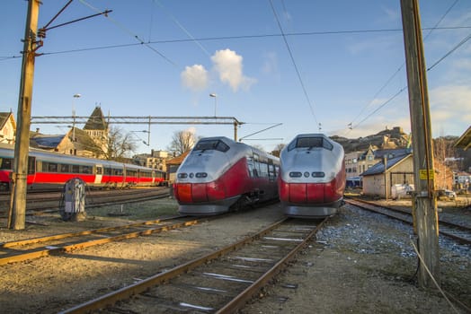 behind Halden train station it is at any given moment placed train which are not running, the image that is shot in december 2012 shows several trains.