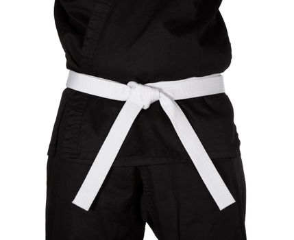 Karate white belt tied around marital artists torso wearing black dojo GI's.