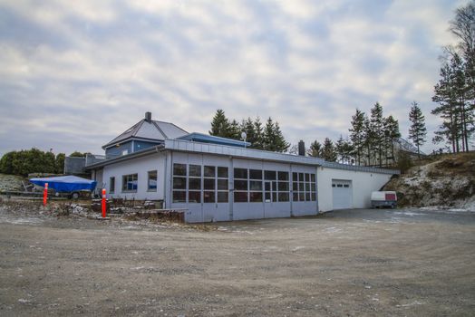 the image is shot in december 2012 and displays one newly built workshop and warehouse facilities somewhere in Halden.