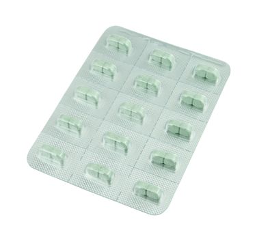 pack of green pills on white background