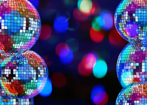 Colorful dark funky background with mirrored glitter disco balls for party