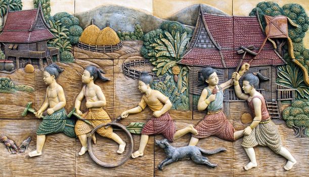 native culture Thai stucco on the temple wall, Thailand