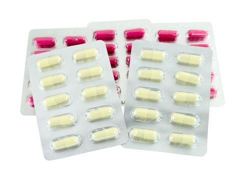 Packs of pills on white background