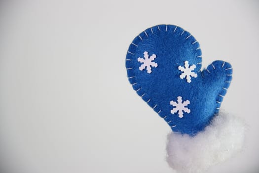 blue glove in christmas on white background 