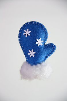 blue glove in christmas on white background 