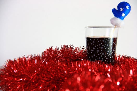 cocktail in christmas on white background with red bokeh