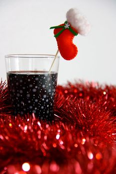 cocktail in christmas on white background with red bokeh