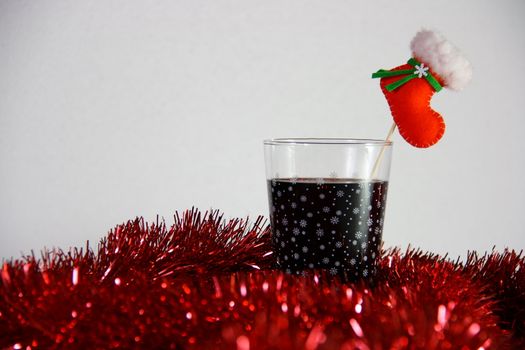 cocktail in christmas on white background with red bokeh