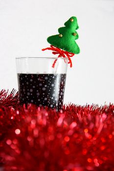 cocktail in christmas on white background with red bokeh