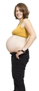 pregnant young woman  with naked belly in white background