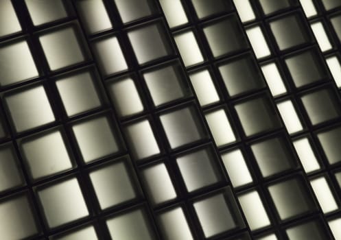 Texture of black and white squares with backlite