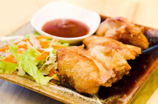 deep fried wonton served with fresh vegetable