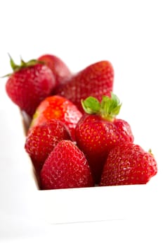 fresh strawberries , berry fruits in white bowl