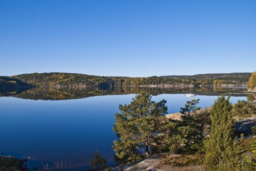 Image is shot by Iddefjord in Halden, Iddefjord borders both to Sweden and Norway