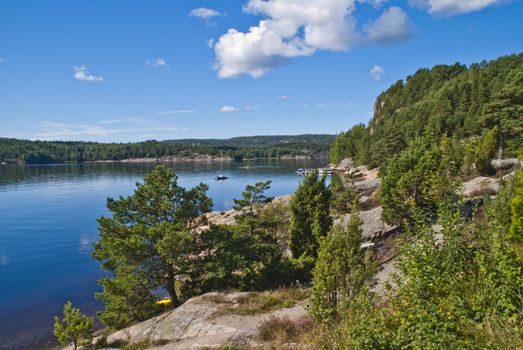 Image is shot by Iddefjord in Halden, Iddefjord borders both to Sweden and Norway