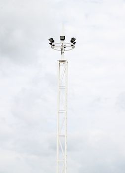 Spot light pole with the sky