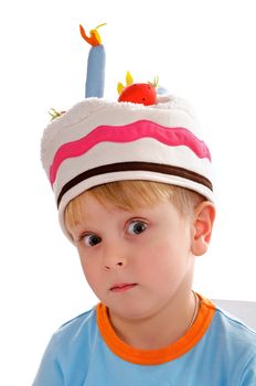 Little Boy in Funny Hat Surprised closeup on white background