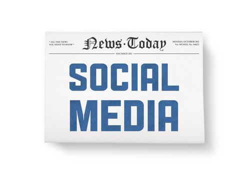 A newspaper with headline "Social Media". Top view shot. Isolated on white.