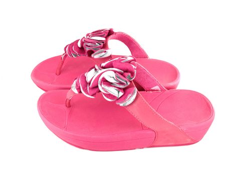 pink slippers on white background