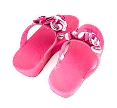 pink slippers on white background