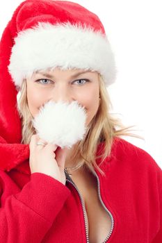 Portrait of joyful pretty woman in red santa claus hat smiling on white background