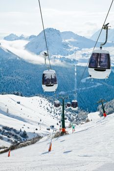 Monocable gondola lift at Val Di Fassa ski resort in Italy