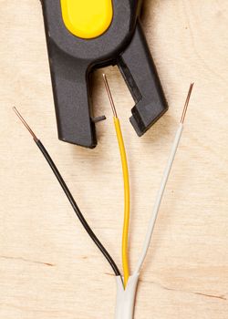 An automatic wire stripper with stripped copper wires